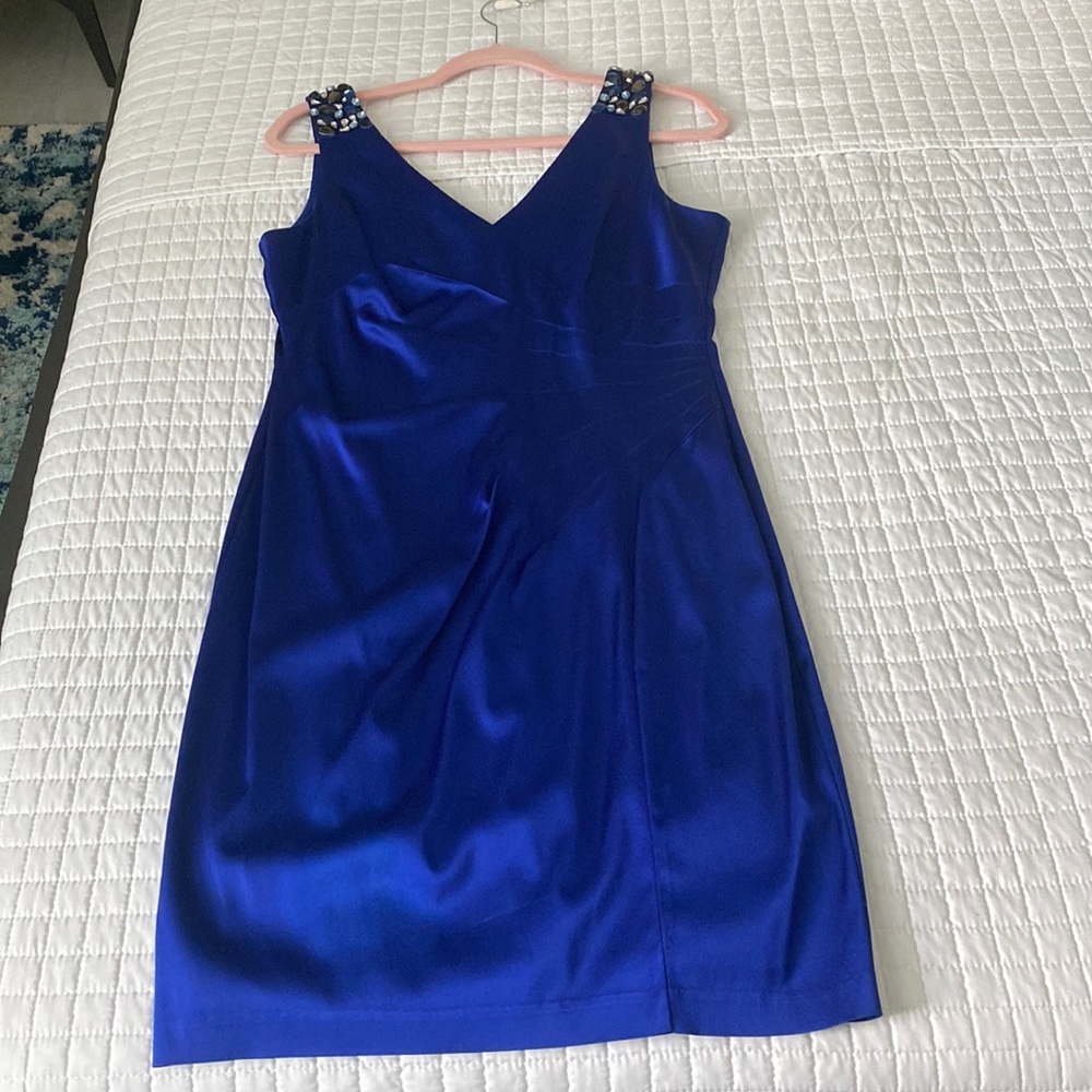 New with tags special occasion dress. Beautiful royal blue color.